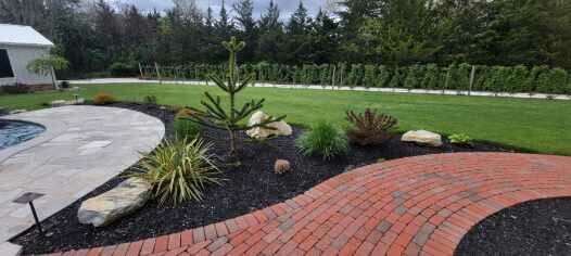 Brick walkway with new planting beds