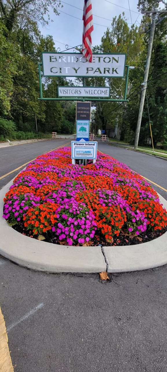 Fall mum display at the Bridgeton City Park entrance sign